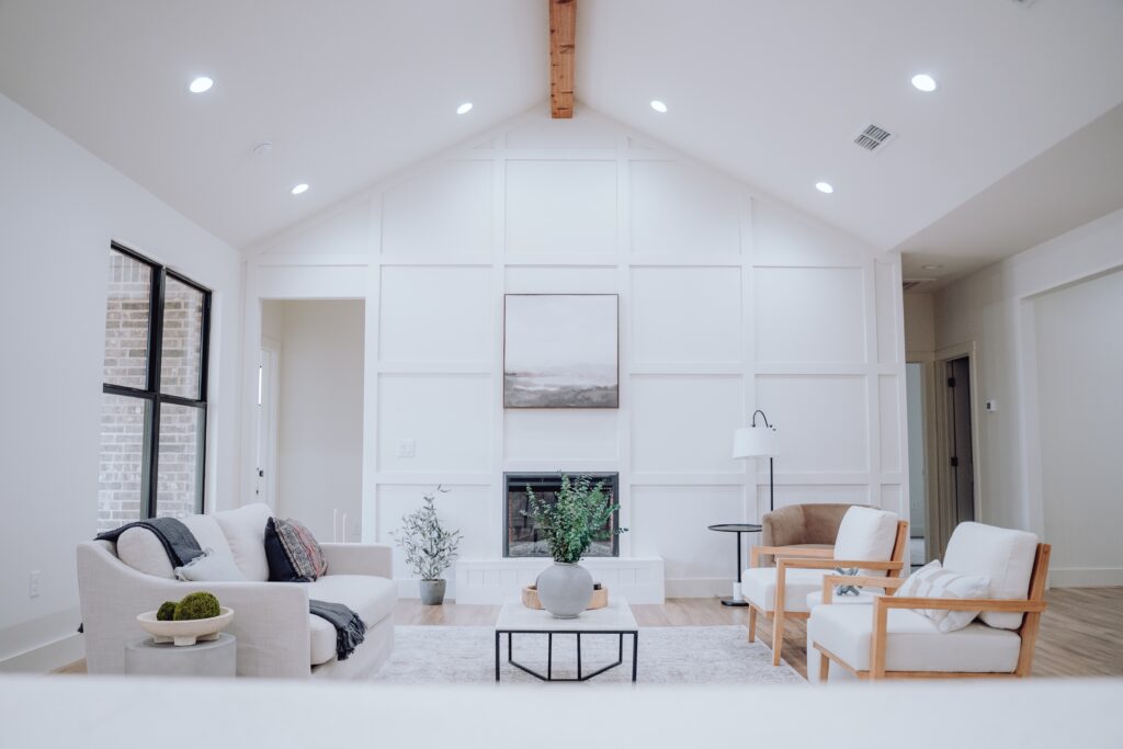 Elegant modern farmhouse living room design, featuring rustic elements combined with contemporary comfort, ideal for cozy living in Calgary's residential areas.